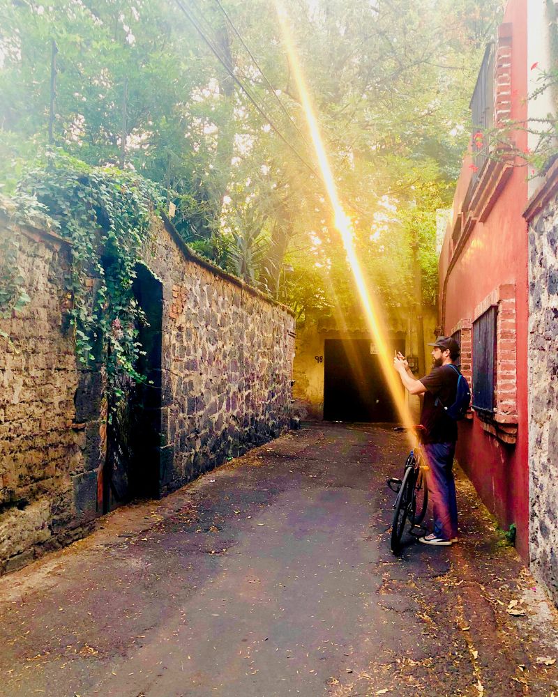 man in callejon del aguacate in coyoacan mexico city (avocado alley)