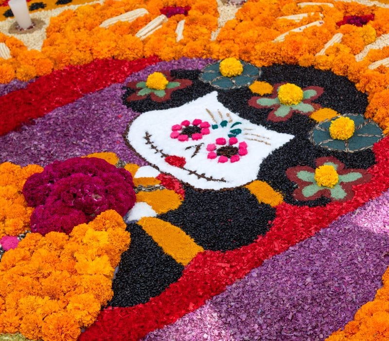 sand art on the ground during day of the dead oaxaca
