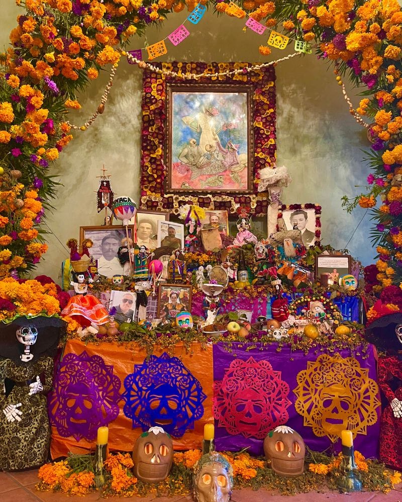 altar decorated for day of the dead in mexico