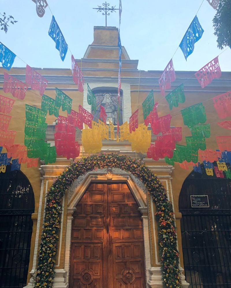 exterior of a colonial church called Chapel of Santa Catarina in Coyoacan Mexico City