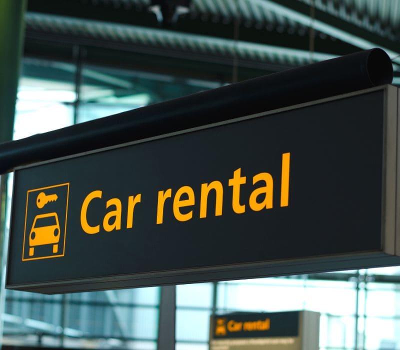 cancun airport car rental sign