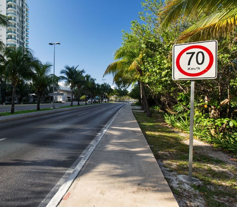 kilometers per hour road sign on a street