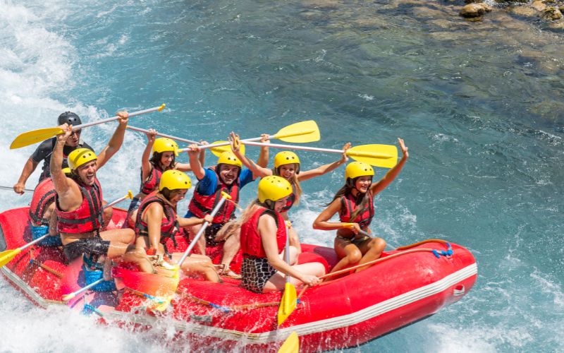 group of tourists on a rafting boat - la huastica potosina tours