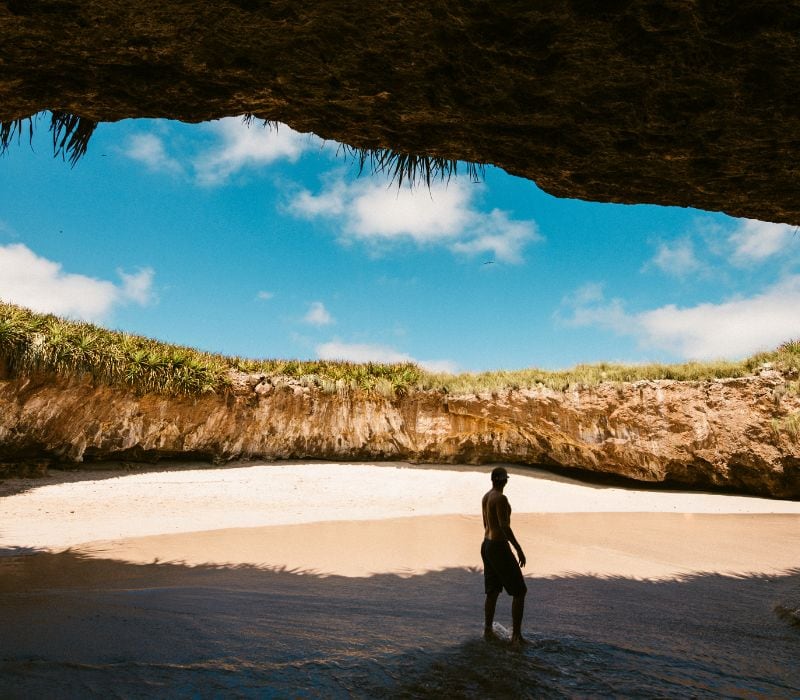 man inside the "Hidden Beach"