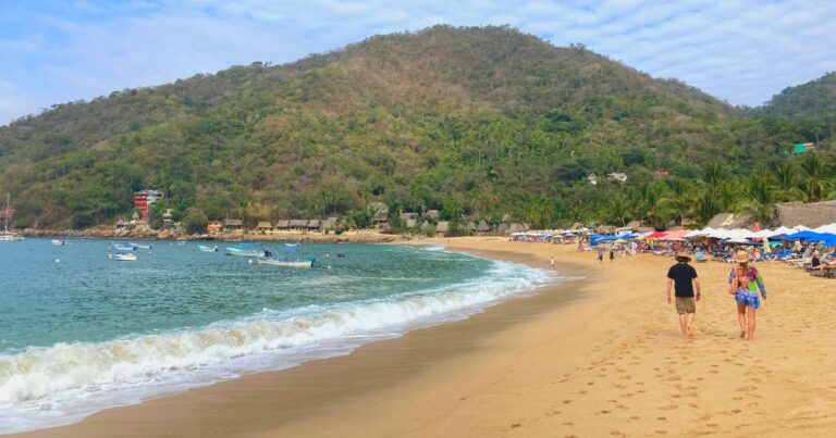 people walking on the beach in yelapa on one of the best yelapa tours from puerto vallarta