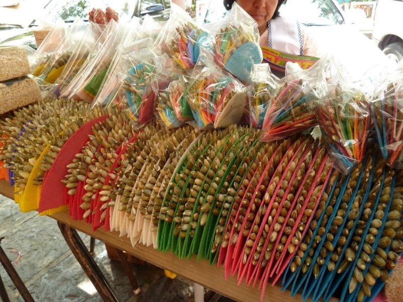 vendor selling colorful Pepitorias mexican candy