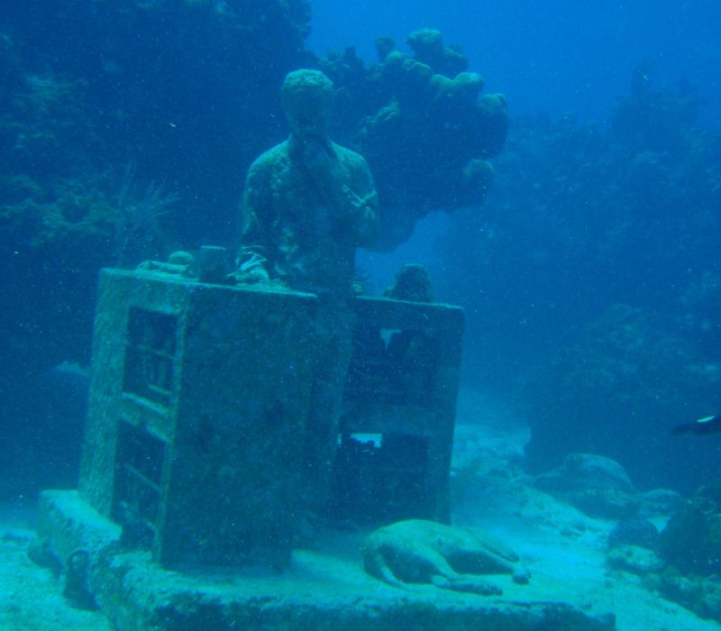 sculpture of a man in underwater museum
