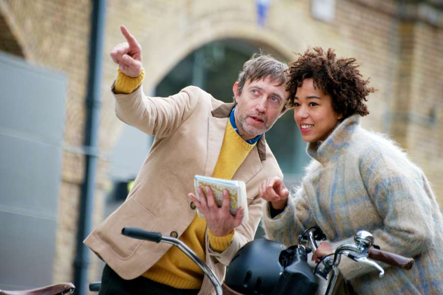 man giving directions to a woman