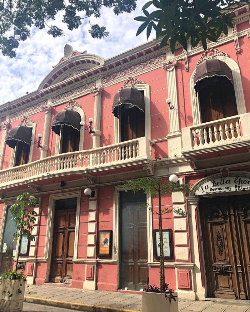 pink colonial building ar centro historico merida