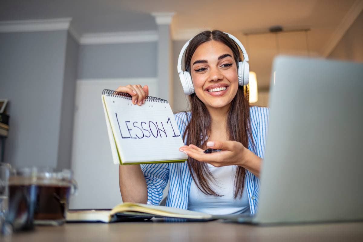 woman with notepad teaching a lesson