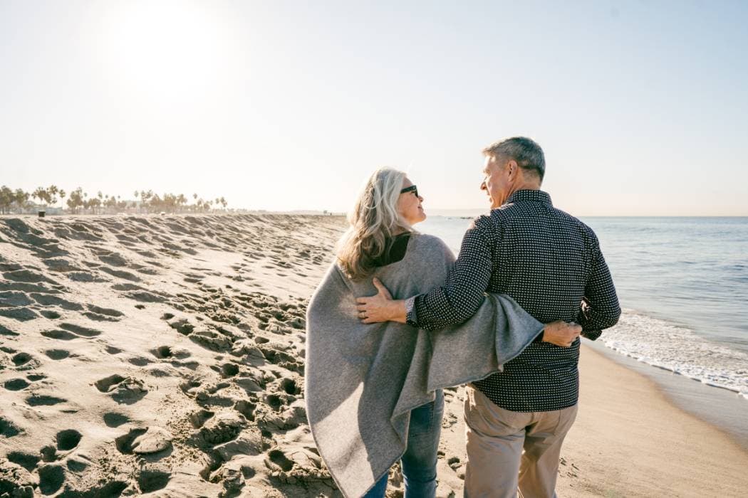 two people on the beach retiree