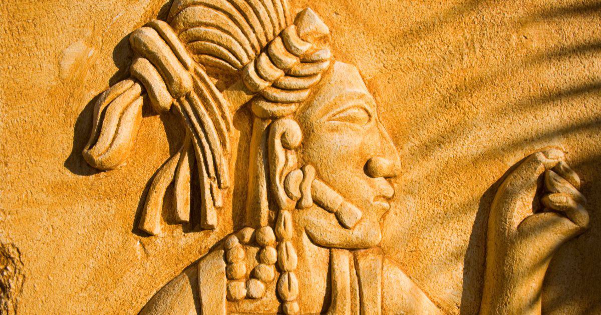 mayan figure on a wall | mayan gods and goddesses