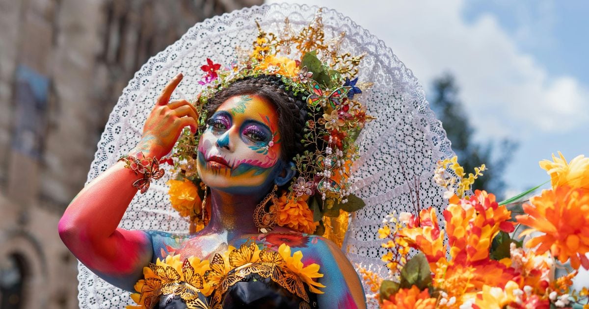 Woman in La Catrina skull face paint