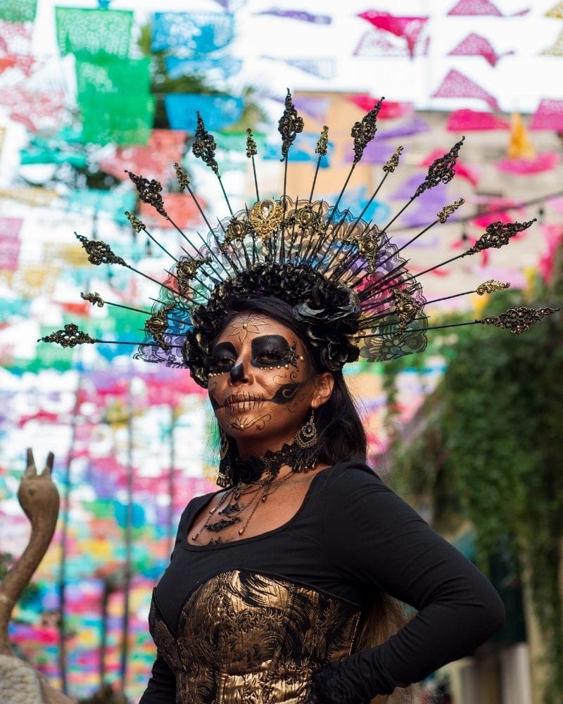 woman painted up as la catrina