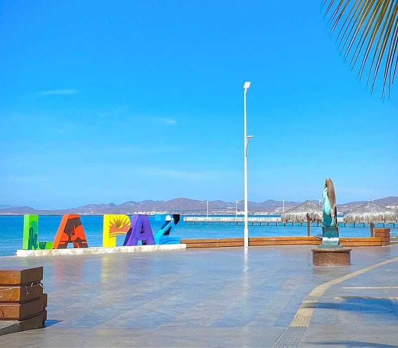 sign with colorful letters spelling out LA PAZ on the La Paz Malecon boardwalk