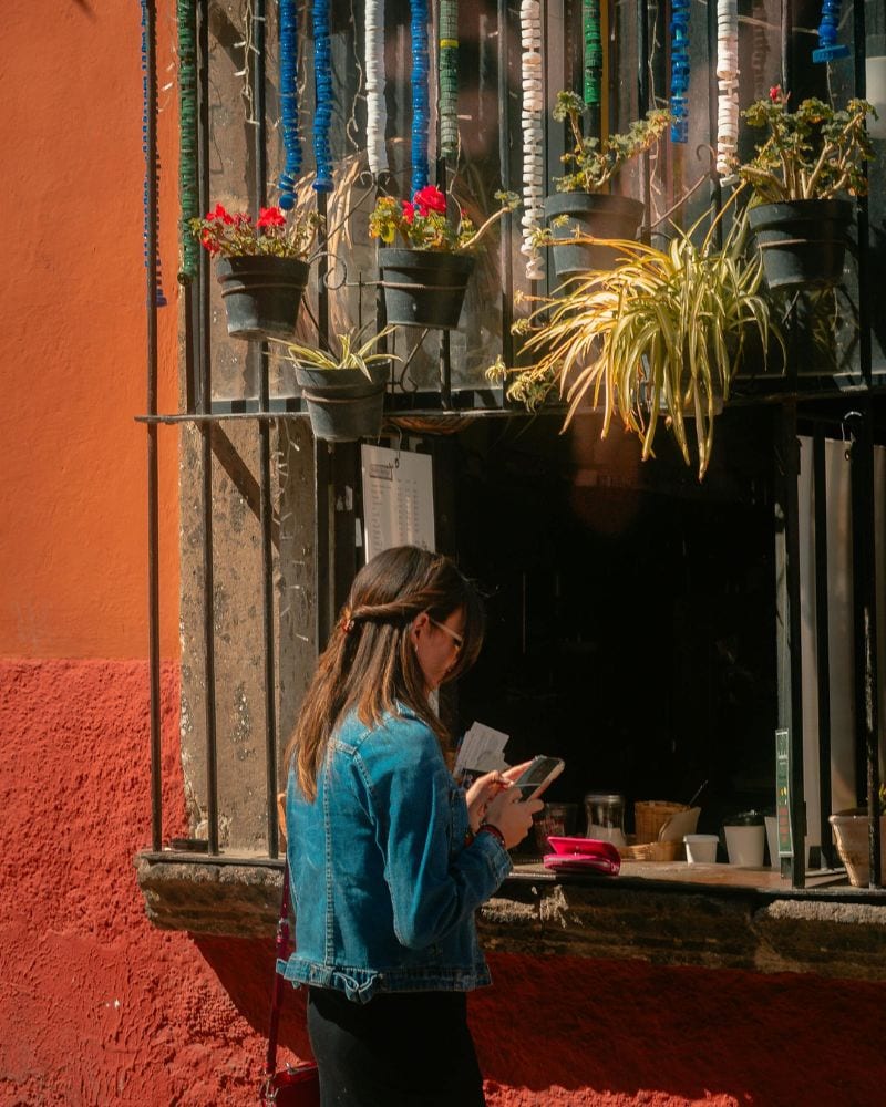 woman at a cafe in san miguel de allende, mexico