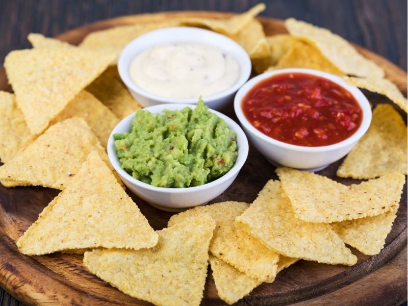 plate of tortilla chips and dips