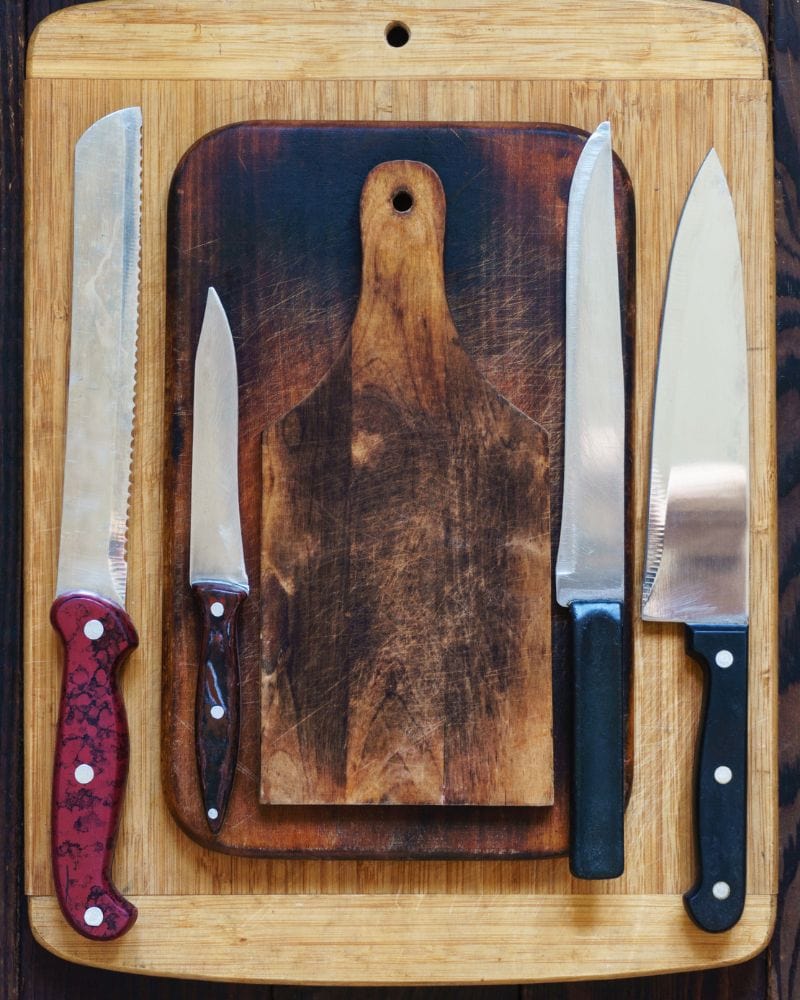 old kitchen knives and cutting board