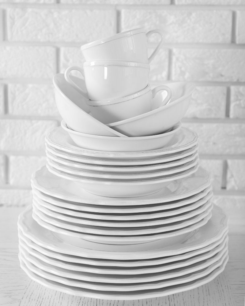 stack of plates, dishes, mugs, cups