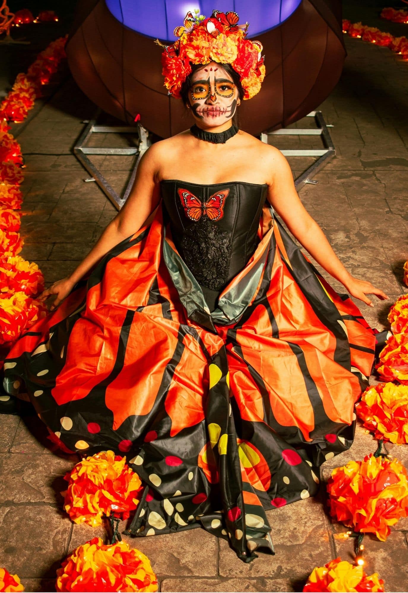 woman in Monarch Butterflies Day of the Dead costume