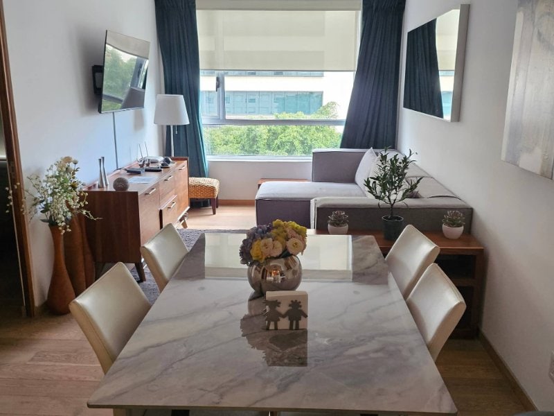 Dining and living room at the 2-bedroom Antara Miyana Airbnb in Polanco, Mexico City