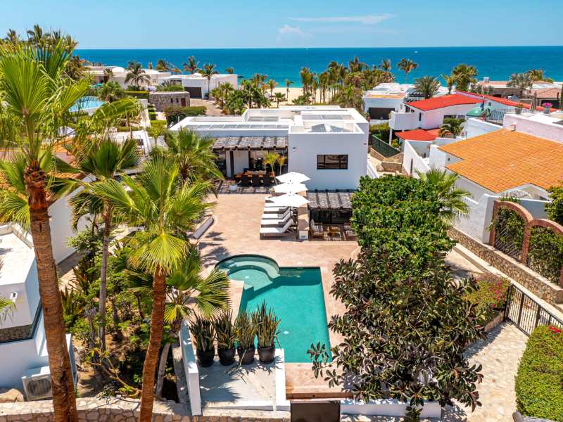 Aerial view of the 4-Bedroom Pedregal Villa and its pool just steps from the beach in Cabo San Lucas