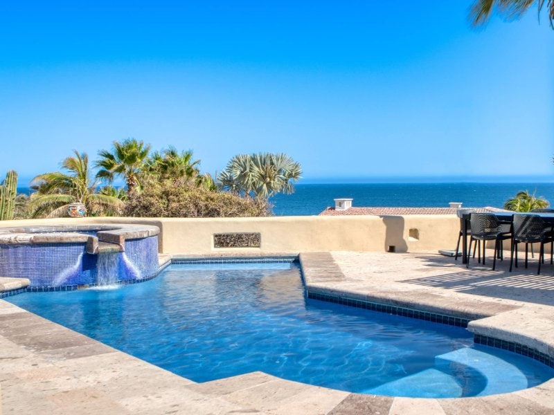 Heated private pool and terrace with ocean views at Casa Dorado, a Pedregal villa with a private chef in Cabo San Lucas