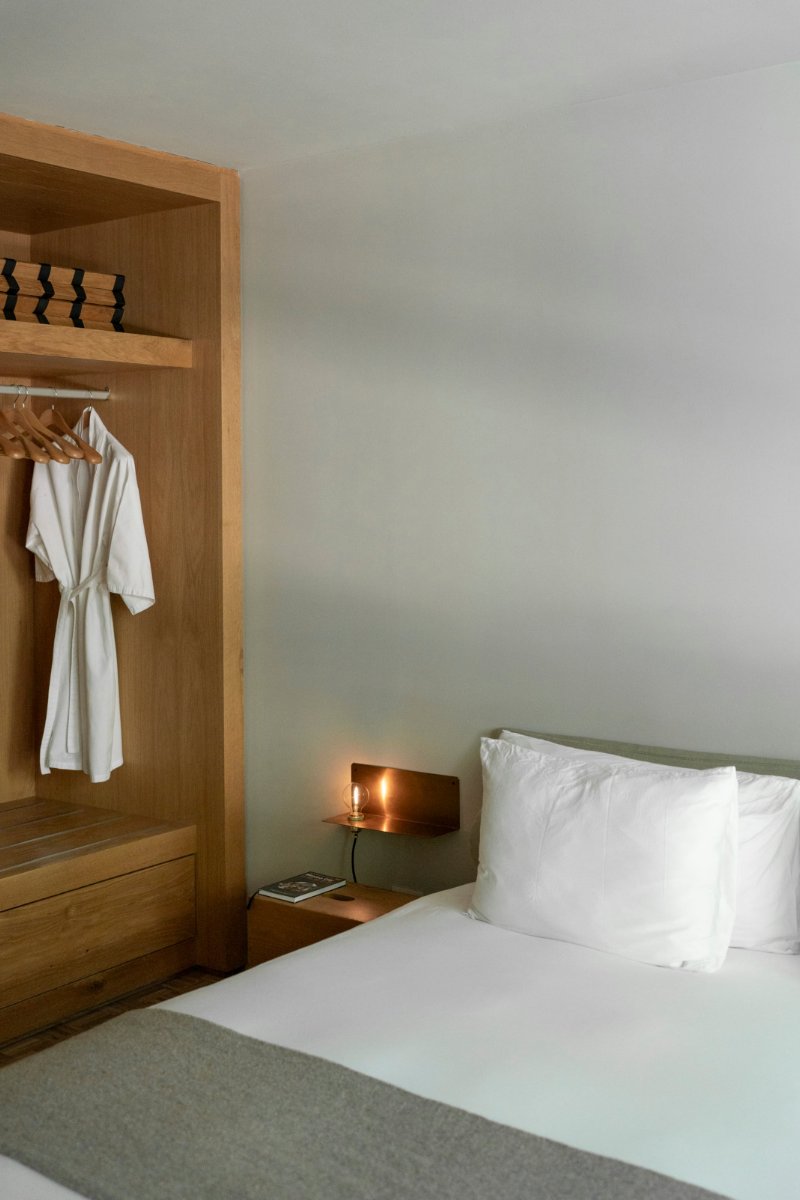 Bedroom with a robe in the closet at Casa TEO Airbnb in Polanco, Mexico City