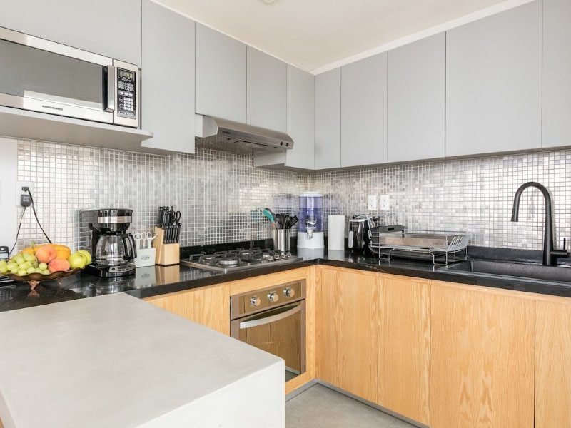Kitchen at the 3-bedroom Condesa house Airbnb with a private rooftop, Mexico City