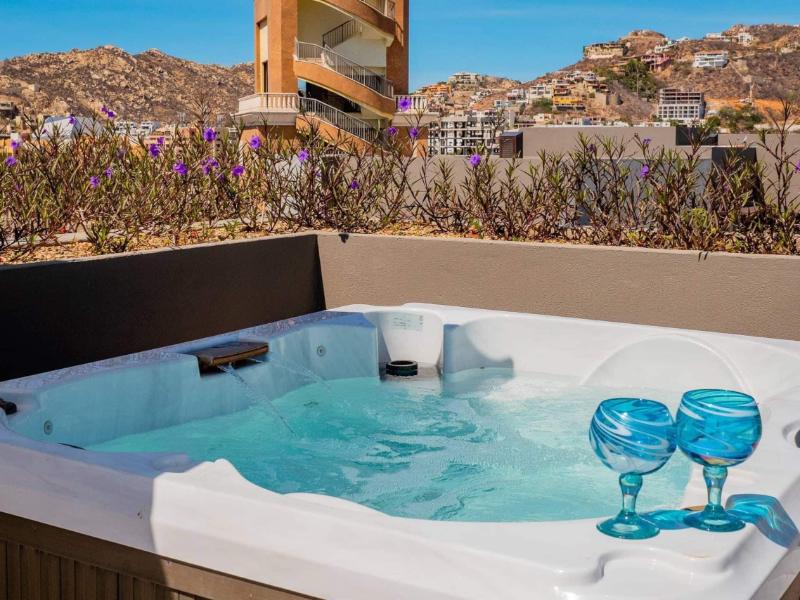 Private rooftop hot tub with mountain views at the Marina Condo with a Private Rooftop Hot Tub, a Cabo San Lucas Airbnb by the Cabo Marina