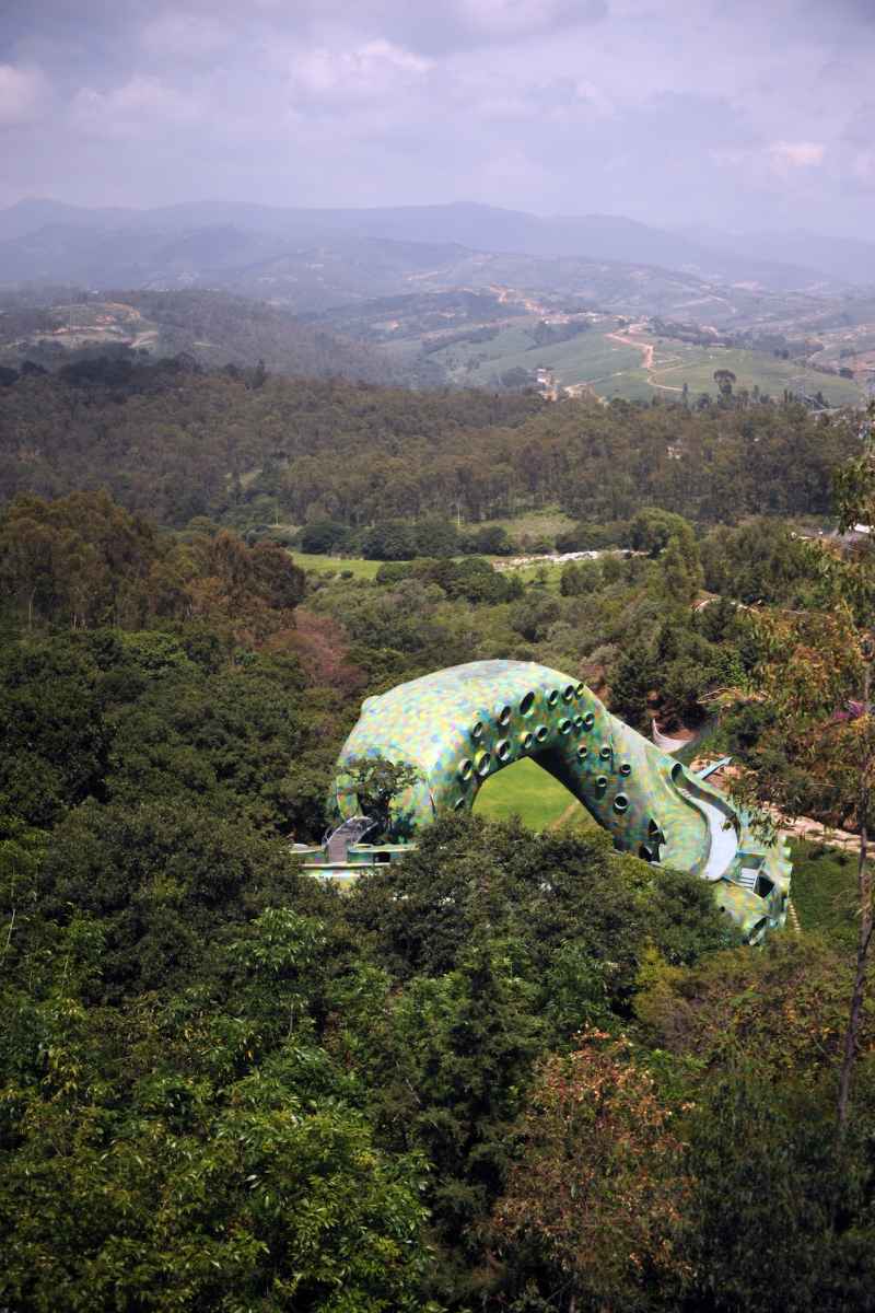 The Mexico City snake house in its wooded valley