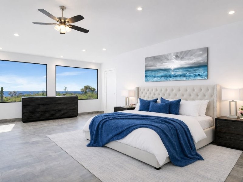 Bedroom with a king bed and desert views at Villa Utopia in Cabo San Lucas